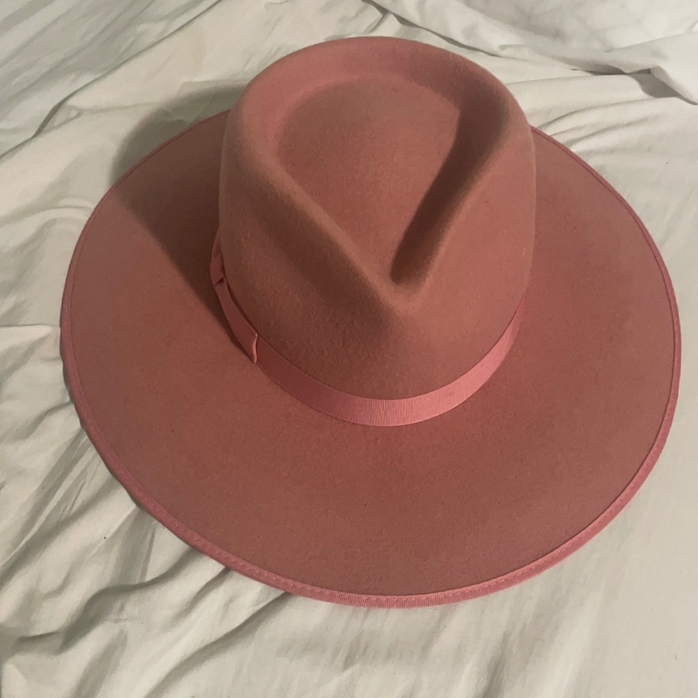 Lack of color hat rose rancher